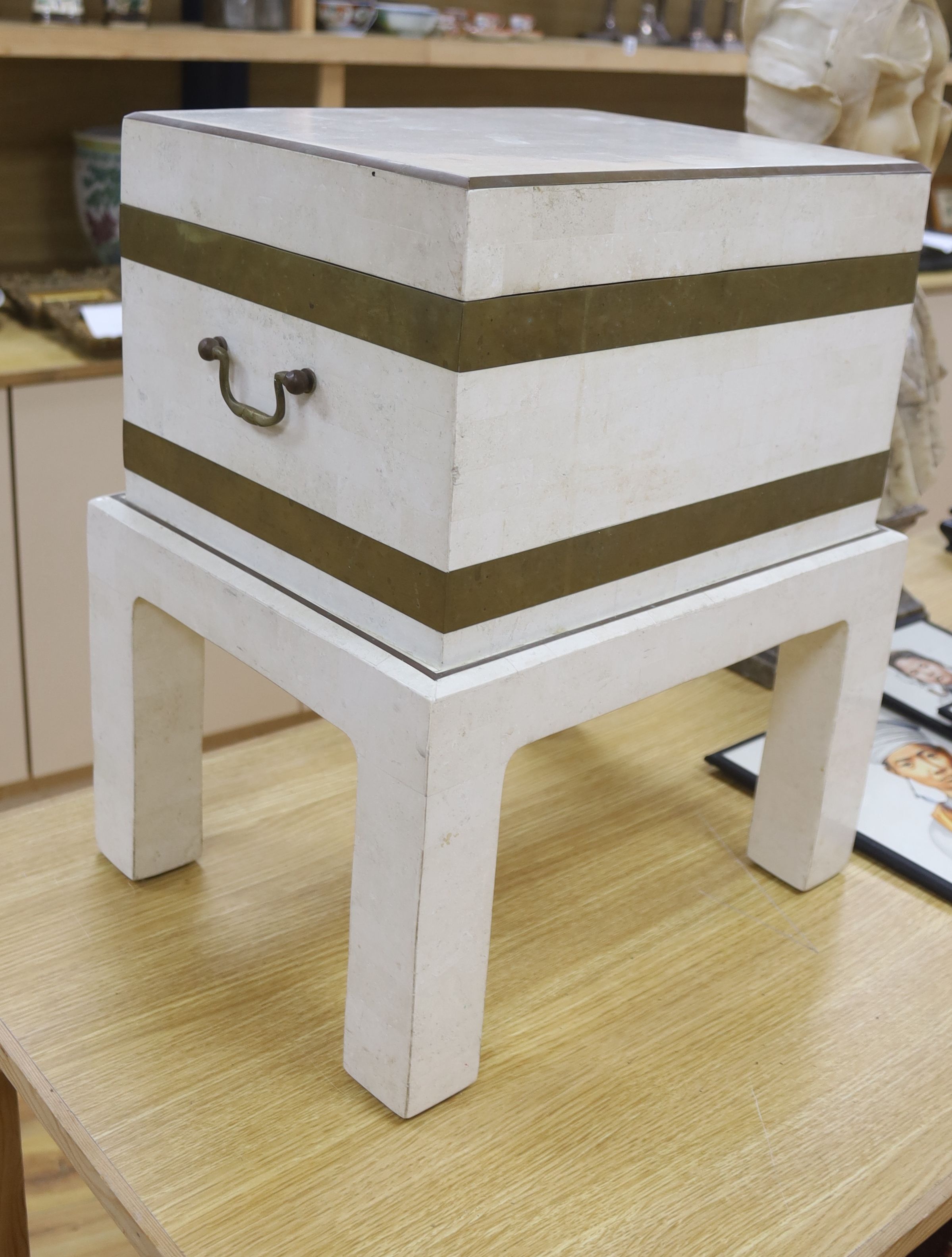 A tessellated limestone box on stand by Maitland Smith, height 49cm